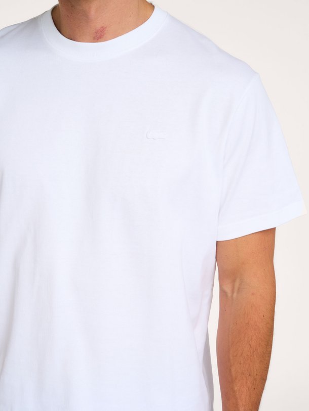 Ontdek de Katoenen logo T-shirt van Lacoste in de kleur Wit bij Orangebag. Op werkdagen voor 21:45 besteld, morgen in huis.