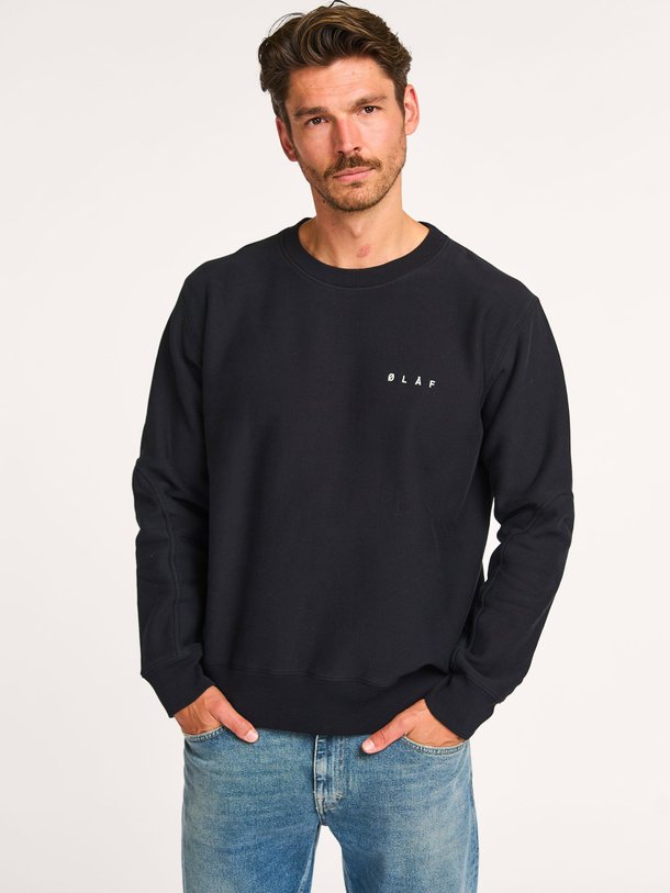 Ontdek de Katoenen sweater van OLAF in de kleur zwart bij Orangebag. Op werkdagen voor 21:45 besteld, morgen in huis.