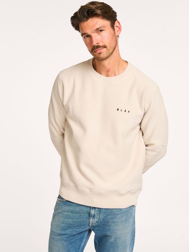 Ontdek de Katoenen logo sweater van OLAF in de kleur stone bij Orangebag. Op werkdagen voor 21:45 besteld, morgen in huis.