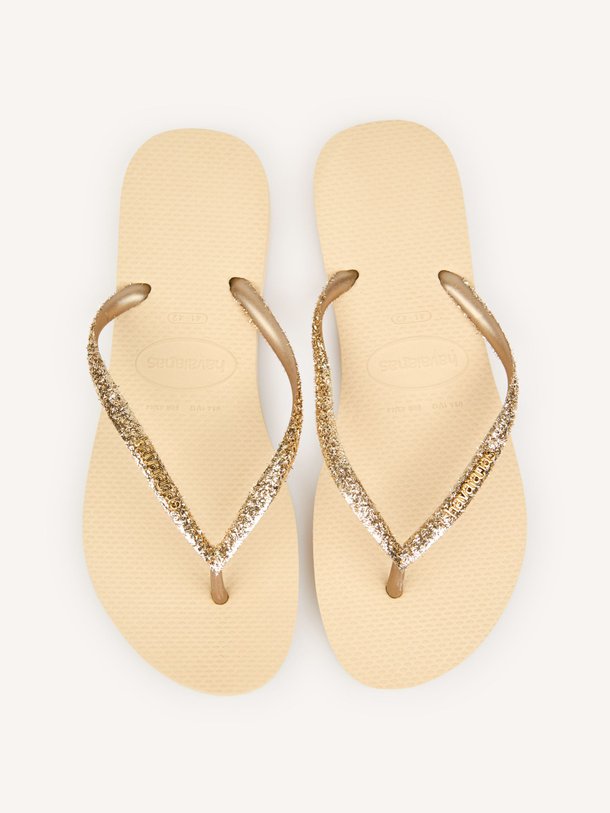 Ontdek de HAV. SLIM GLITTER II van Havaianas bij Orangebag. Op werkdagen voor 21:45 besteld, morgen in huis.