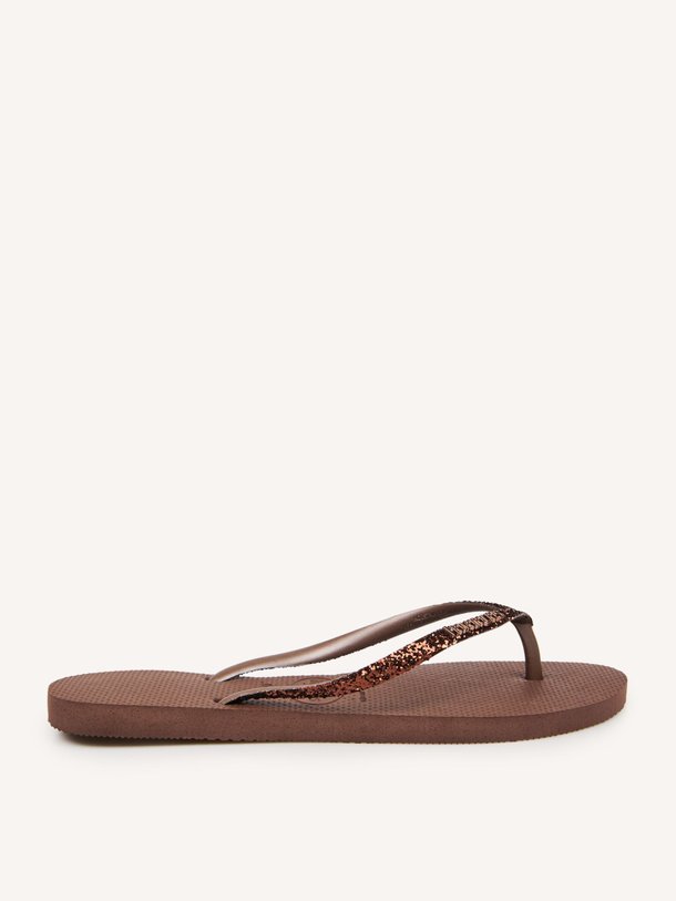 Ontdek de HAV. SLIM GLITTER II van Havaianas bij Orangebag. Op werkdagen voor 21:45 besteld, morgen in huis.