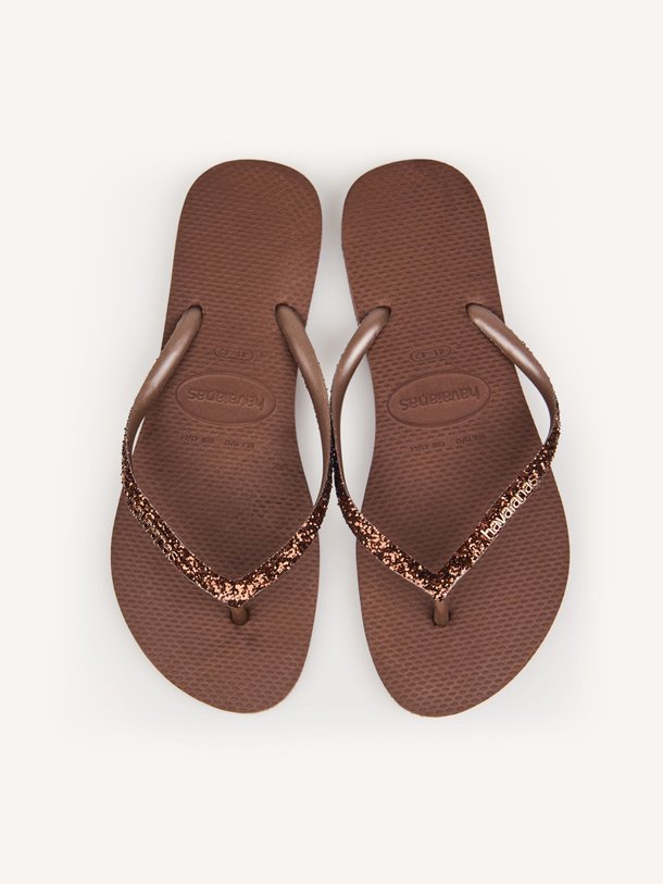 Ontdek de HAV. SLIM GLITTER II van Havaianas bij Orangebag. Op werkdagen voor 21:45 besteld, morgen in huis.