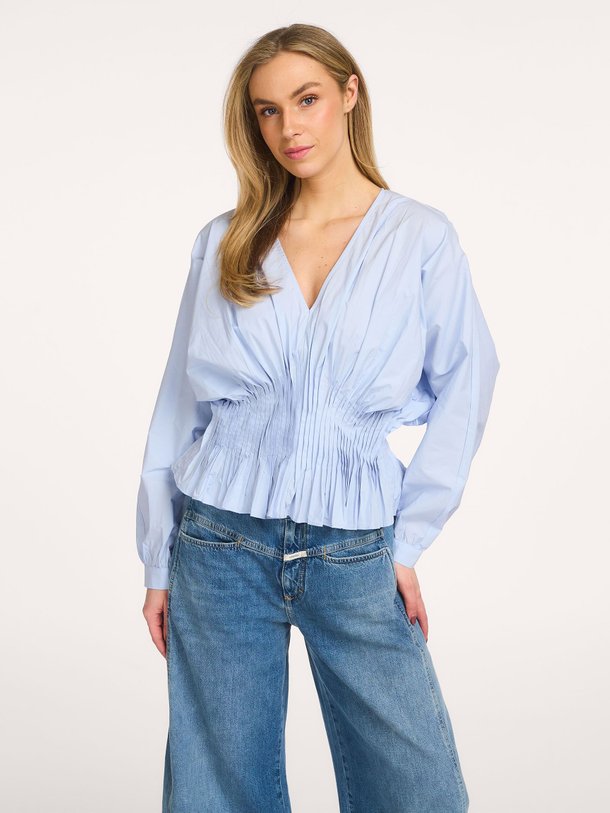 Ontdek de Organic cotton poplin top van Copenhagen Muse in de kleur Lichtblauw bij Orangebag. Op werkdagen voor 21:45 besteld, morgen in huis.