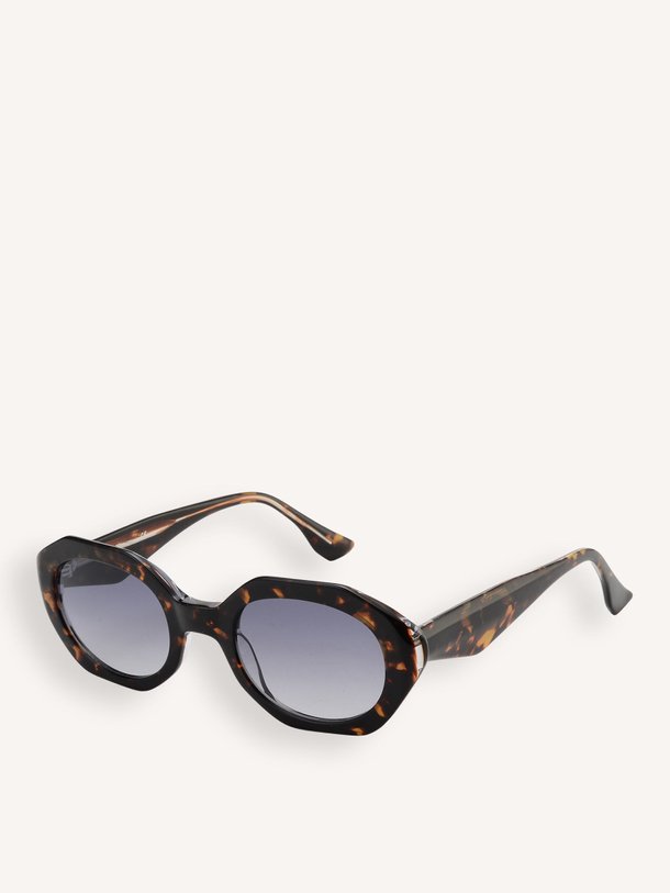 Ontdek de Zonnebril met dessin van Yaya in de kleur Donkerbruin bij Orangebag. Op werkdagen voor 21:45 besteld, morgen in huis.