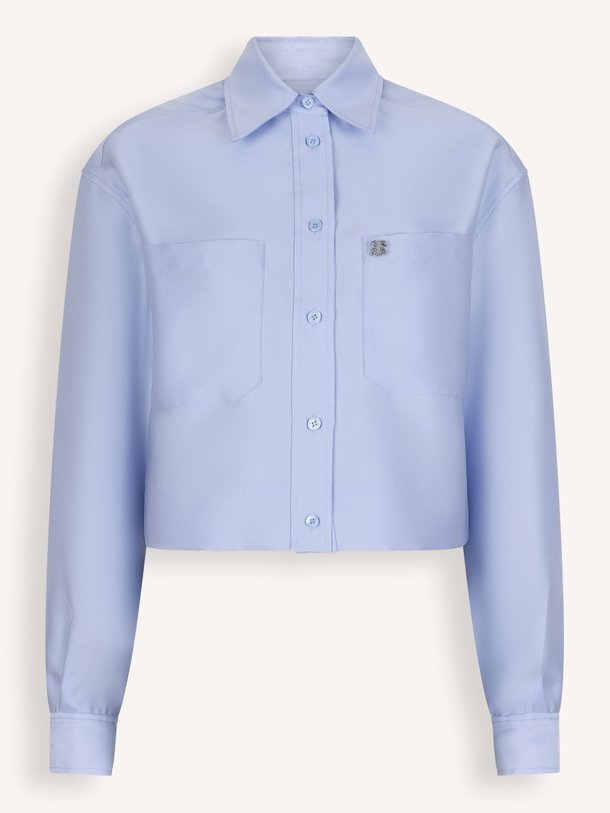 Ontdek de Hari geweven blouse van Dante 6 in de kleur Lichtblauw bij Orangebag. Op werkdagen voor 21:45 besteld, morgen in huis.