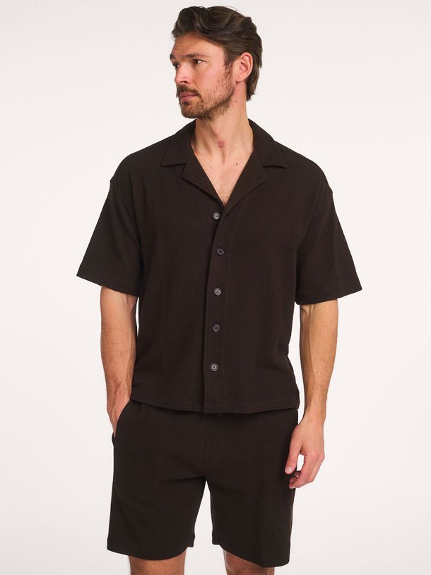 Ontdek de Basiil katoenen overhemd van Drykorn in de kleur Bruin bij Orangebag. Op werkdagen voor 21:45 besteld, morgen in huis.