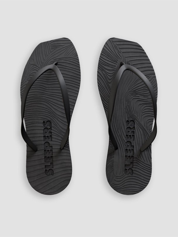 Ontdek de Tapered rubberen slippers van Sleepers in de kleur zwart bij Orangebag. Op werkdagen voor 21:45 besteld, morgen in huis.