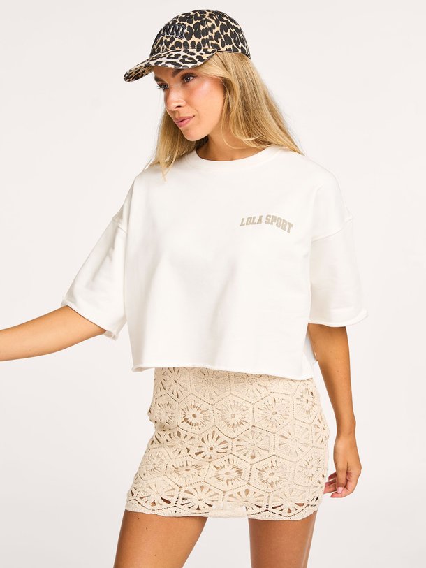 Ontdek de Amber katoenen sweat T-shirt van The Lola Club in de kleur wit bij Orangebag. Op werkdagen voor 21:45 besteld, morgen in huis.