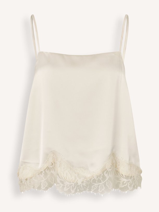 Ontdek de Vue geweven top met kant van Modstrom in de kleur Crème bij Orangebag. Op werkdagen voor 21:45 besteld, morgen in huis.