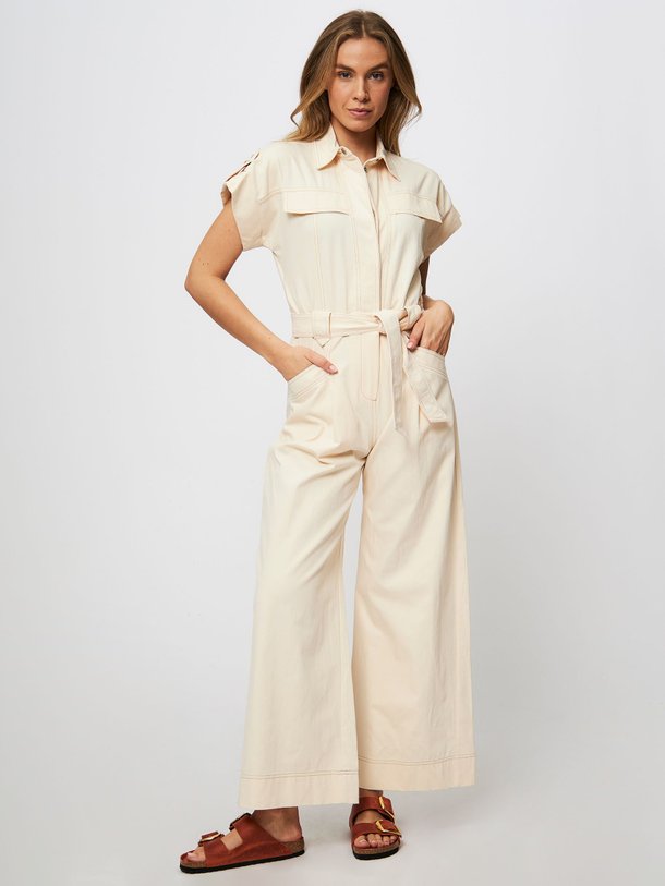 Ontdek de Tomy katoenen jumpsuit van Suncoo in de kleur crème bij Orangebag. Op werkdagen voor 21:45 besteld, morgen in huis.
