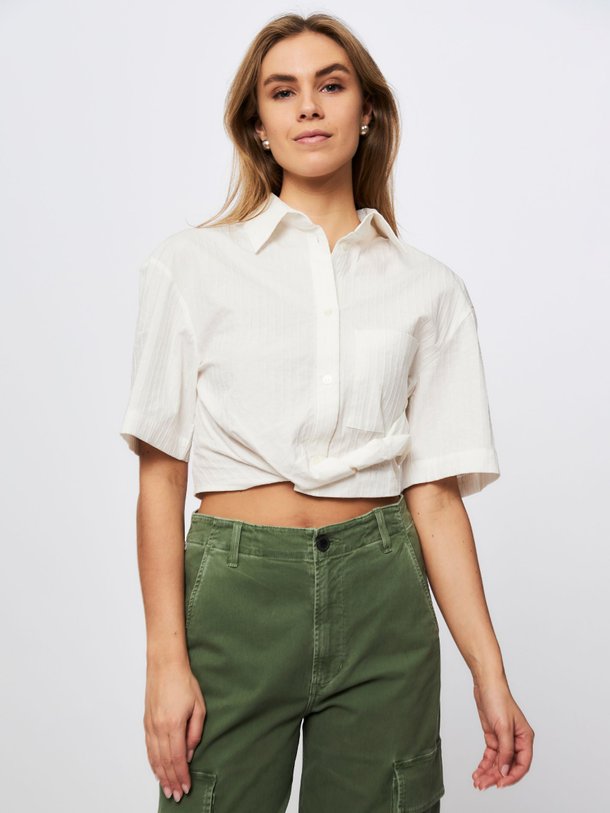 Ontdek de Katoenmix blouse met structuur van Les Coyotes de Paris in de kleur wit bij Orangebag. Op werkdagen voor 21:45 besteld, morgen in huis.