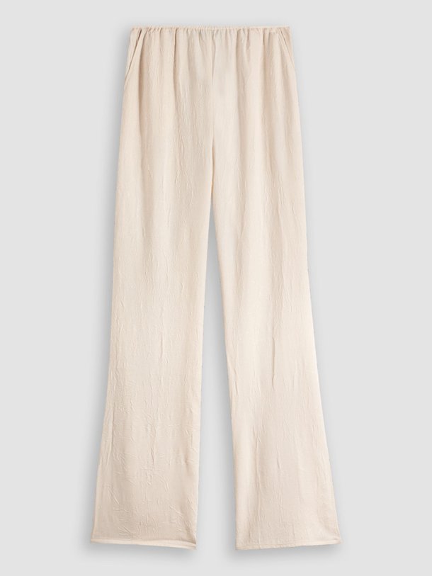 Ontdek de Garcella geweven flared broek met structuur van Another-Label in de kleur zand bij Orangebag. Op werkdagen voor 21:45 besteld, morgen in huis.