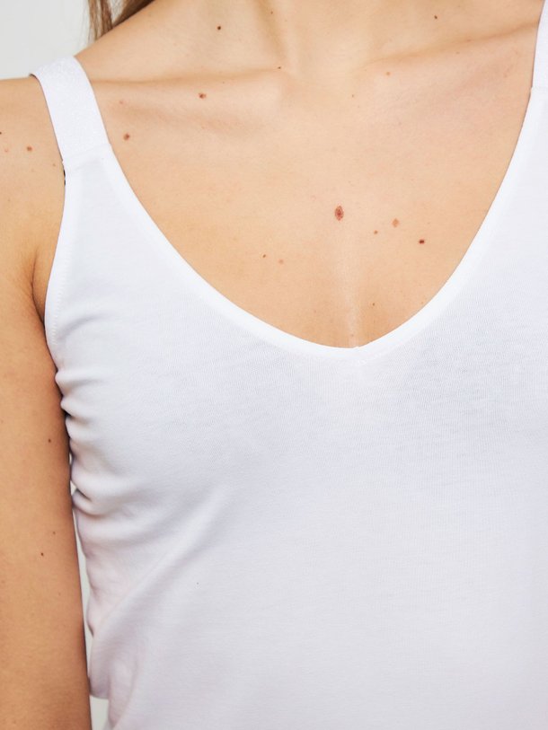 Ontdek de Nice organic cotton reversible top met lurex van Summum in de kleur wit bij Orangebag. Op werkdagen voor 21:45 besteld, morgen in huis.