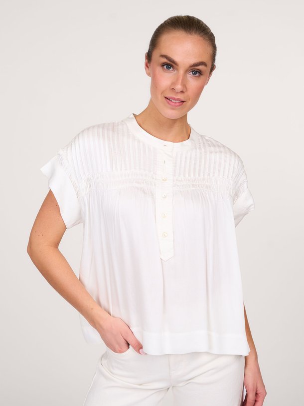 Ontdek de Iris viscose top van Alchemist in de kleur ecru bij Orangebag. Op werkdagen voor 21:45 besteld, morgen in huis.