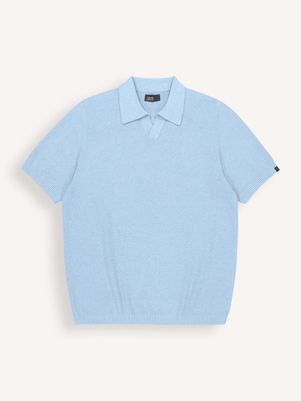 Ontdek de Katoenmix bouclé polo van Butcher of Blue in de kleur Lichtblauw bij Orangebag. Op werkdagen voor 21:45 besteld, morgen in huis.