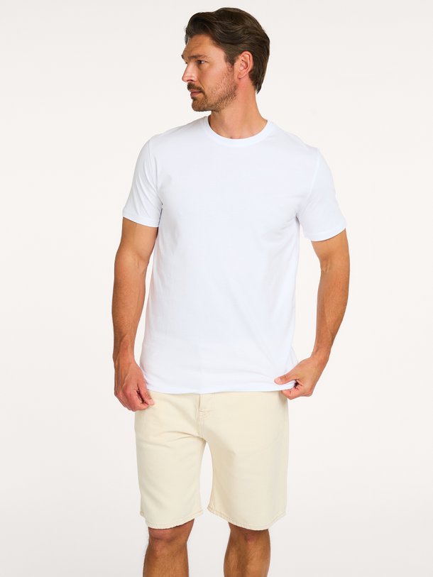 Ontdek de Flower T-Shirt van Les Deux bij Orangebag. Op werkdagen voor 21:45 besteld, morgen in huis.