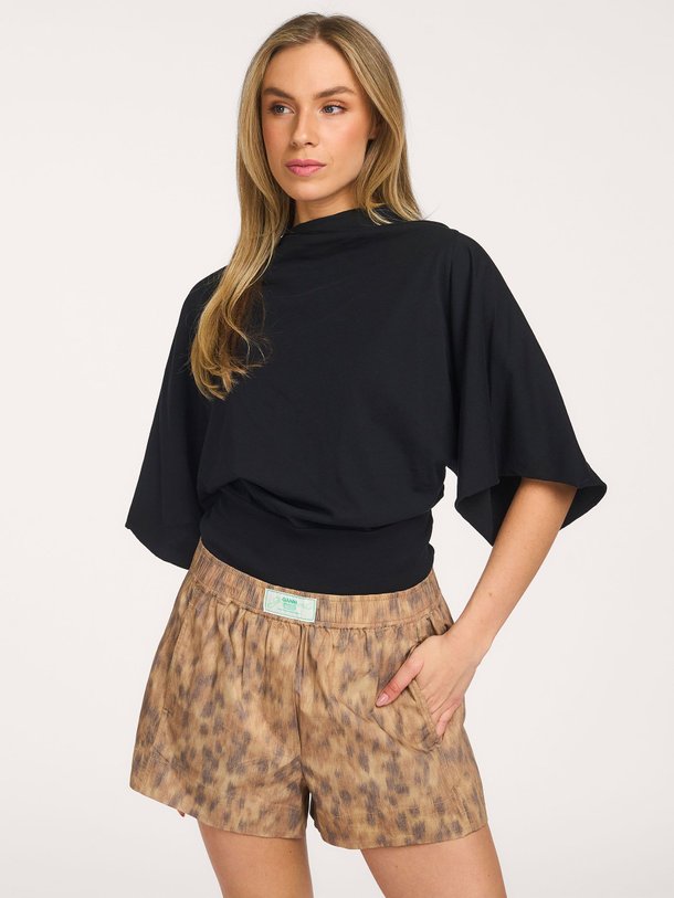 Ontdek de Organic cottonmix short met print van Ganni in de kleur Bruin bij Orangebag. Op werkdagen voor 21:45 besteld, morgen in huis.