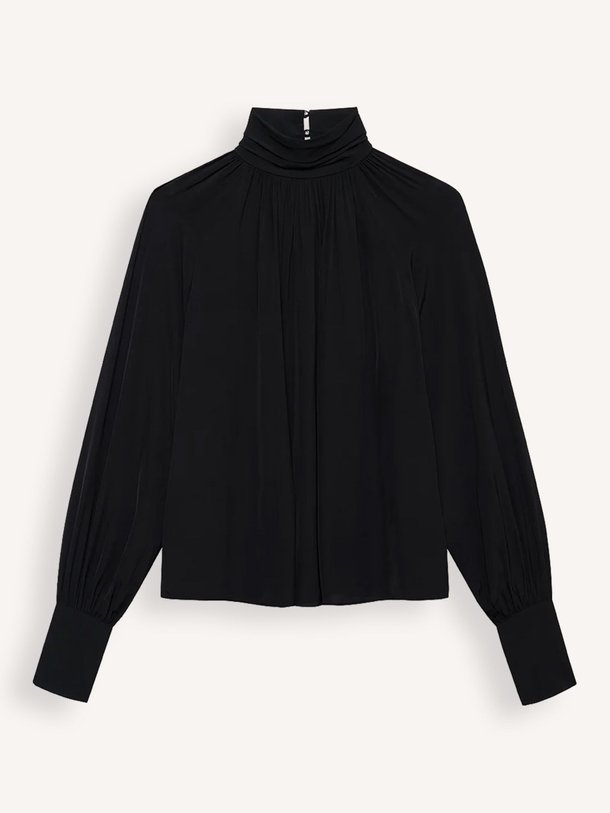 Ontdek de Anne viscose top van Anine Bing in de kleur Zwart bij Orangebag. Op werkdagen voor 21:45 besteld, morgen in huis.