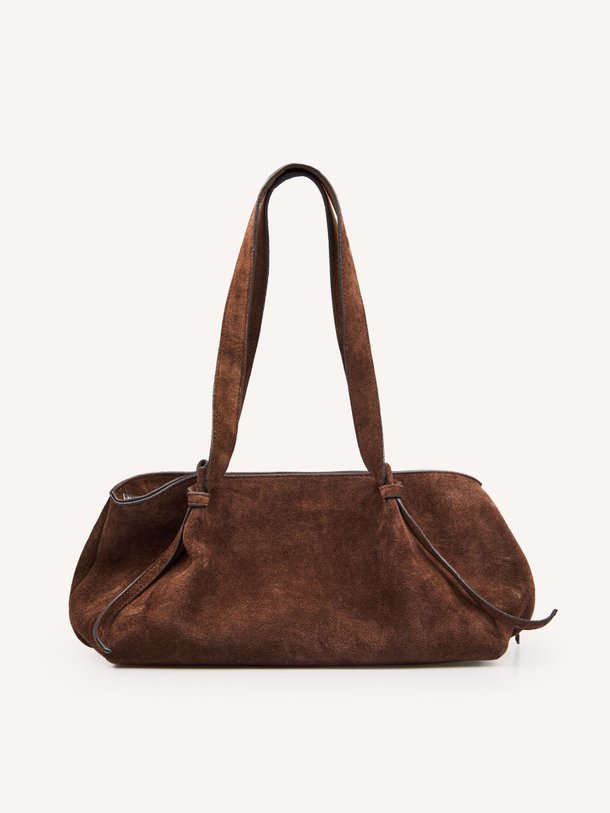 Ontdek de Rosalina suède handtas van Studio AR in de kleur Donkerbruin bij Orangebag. Op werkdagen voor 21:45 besteld, morgen in huis.