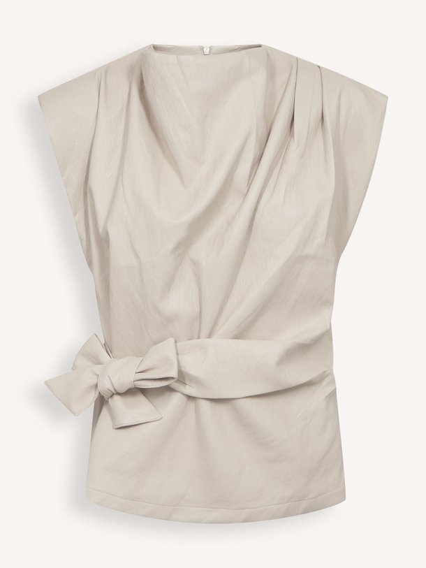 Ontdek de Gitt leatherlook top van Co'Couture in de kleur Crème bij Orangebag. Op werkdagen voor 21:45 besteld, morgen in huis.