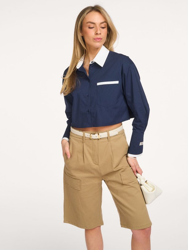 Ontdek de Steph katoenmix gestreepte cropped blouse van The Lola Club in de kleur Donkerblauw bij Orangebag. Op werkdagen voor 21:45 besteld, morgen in huis.