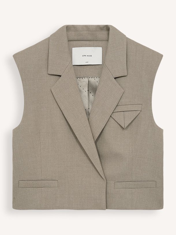 Ontdek de Tailor viscosemix gilet van Copenhagen Muse in de kleur lichtbruin bij Orangebag. Op werkdagen voor 21:45 besteld, morgen in huis.