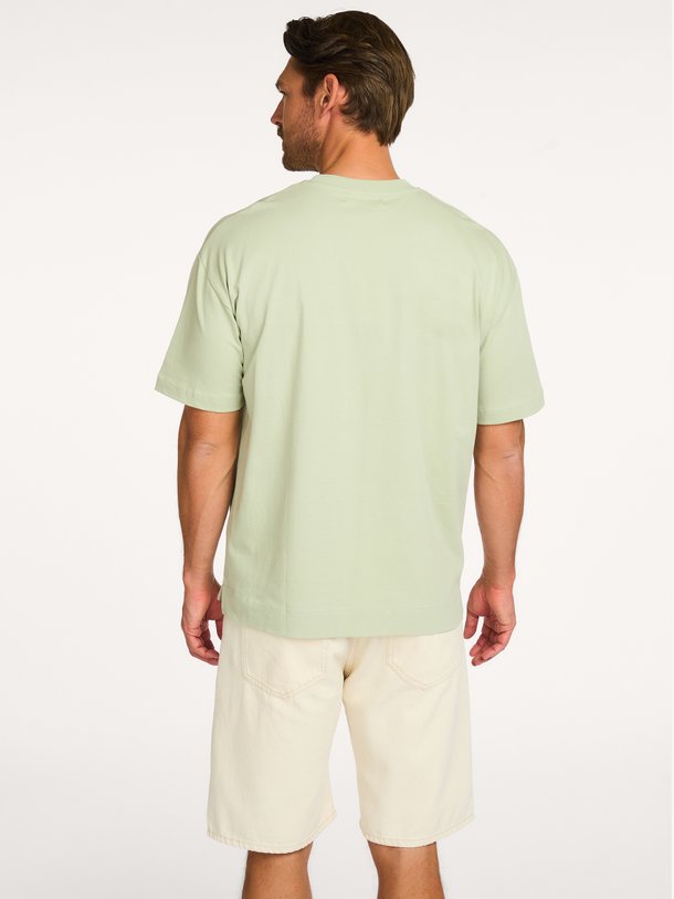 Ontdek de JOEL T-SHIRT 11415 van Samsoe Samsoe bij Orangebag. Op werkdagen voor 21:45 besteld, morgen in huis.