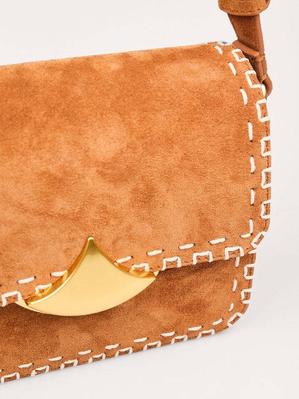 Ontdek de Diviluz suède crossbody tas van Sessun in de kleur Camel bij Orangebag. Op werkdagen voor 21:45 besteld, morgen in huis.