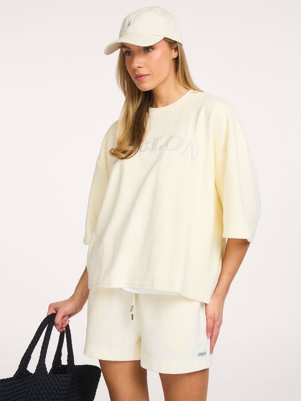 Ontdek de Vine katoenmix badstof logo sweater van Deblon in de kleur Crème bij Orangebag. Op werkdagen voor 21:45 besteld, morgen in huis.