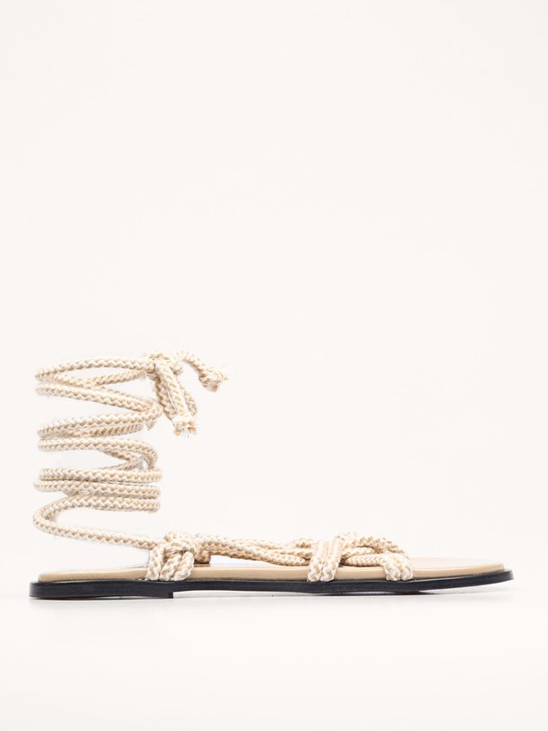 Ontdek de Tory gevlochten sandalen van Alohas in de kleur beige bij Orangebag. Op werkdagen voor 21:45 besteld, morgen in huis.