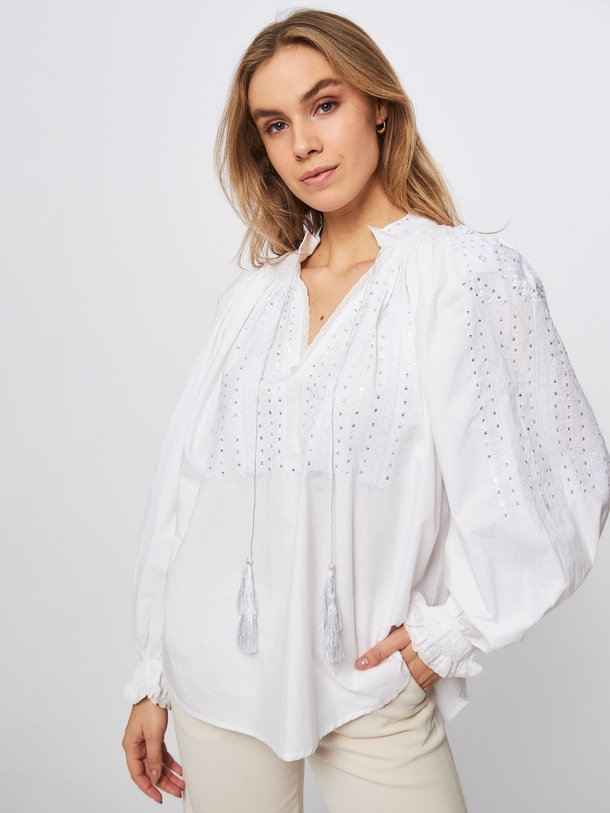 Ontdek de Shahi katoenen top met applicaties van Laurence Bras in de kleur wit bij Orangebag. Op werkdagen voor 21:45 besteld, morgen in huis.