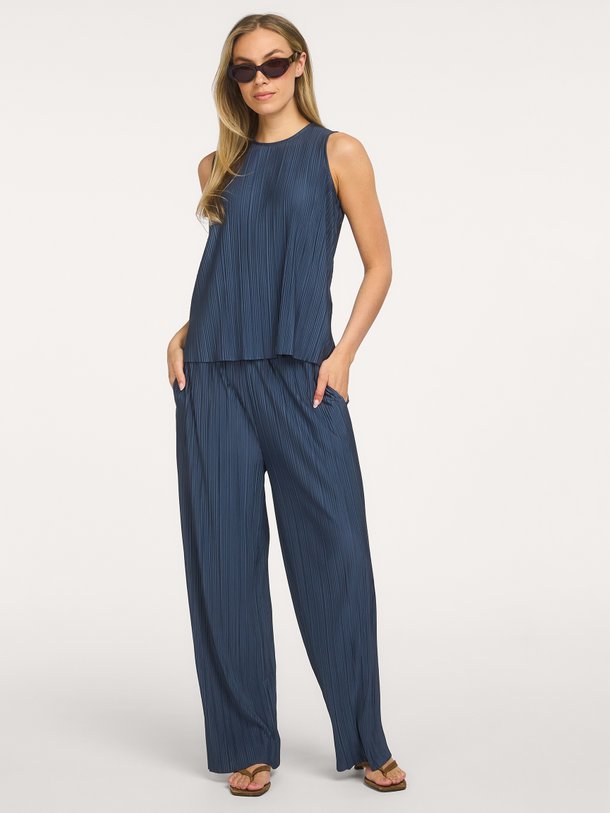 Ontdek de UMA TROUSERS 10167 van Samsoe Samsoe bij Orangebag. Op werkdagen voor 21:45 besteld, morgen in huis.