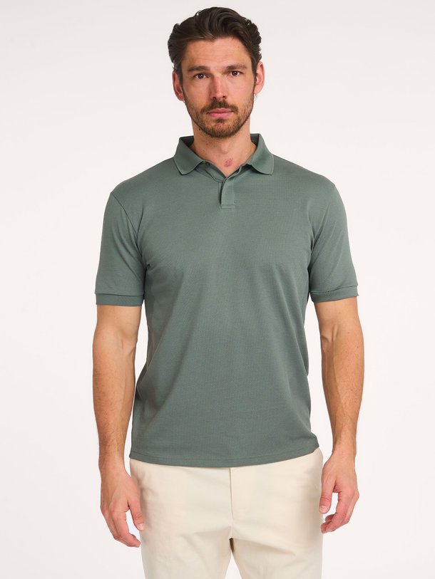 Ontdek de Santos katoenmix polo van Drykorn in de kleur Donkergroen bij Orangebag. Op werkdagen voor 21:45 besteld, morgen in huis.