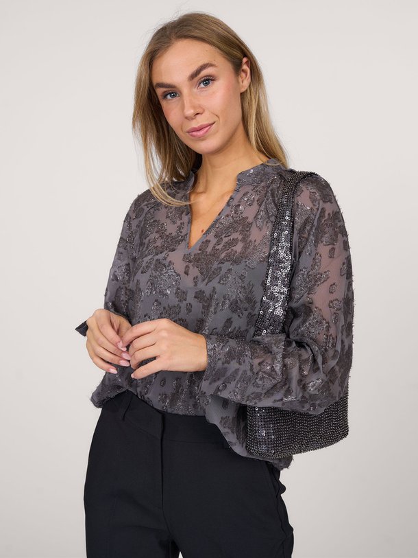 Ontdek de Carisa geweven top met lurex van Second Female in de kleur grijs bij Orangebag. Op werkdagen voor 21:45 besteld, morgen in huis.