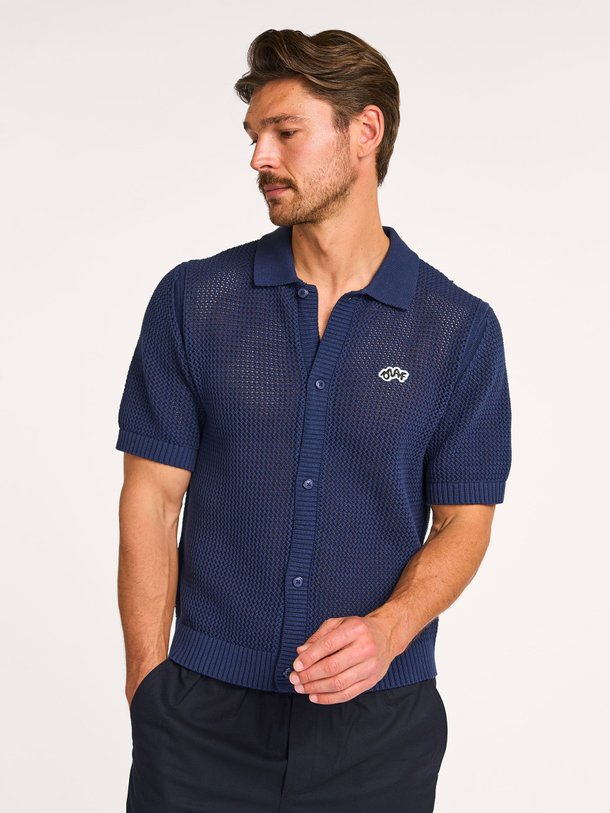 Ontdek de Katoenmix polo vest van OLAF in de kleur donkerblauw bij Orangebag. Op werkdagen voor 21:45 besteld, morgen in huis.