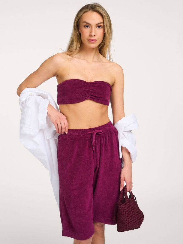 Ontdek de Katoenen badstof bandeau top van Speezys in de kleur Aubergine bij Orangebag. Op werkdagen voor 21:45 besteld, morgen in huis.