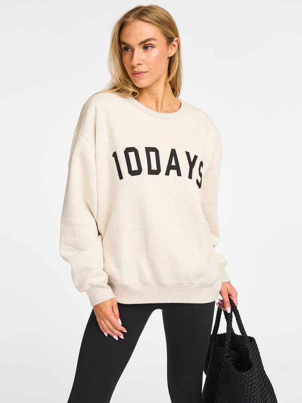 Ontdek de Katoenmix gemêleerde logo sweater van 10Days in de kleur ecru bij Orangebag. Op werkdagen voor 21:45 besteld, morgen in huis.