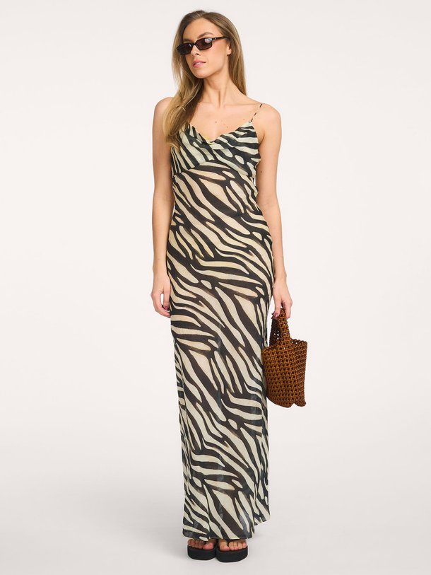 Ontdek de Amara ramie maxi jurk van The Lola Club in de kleur Zwart bij Orangebag. Op werkdagen voor 21:45 besteld, morgen in huis.