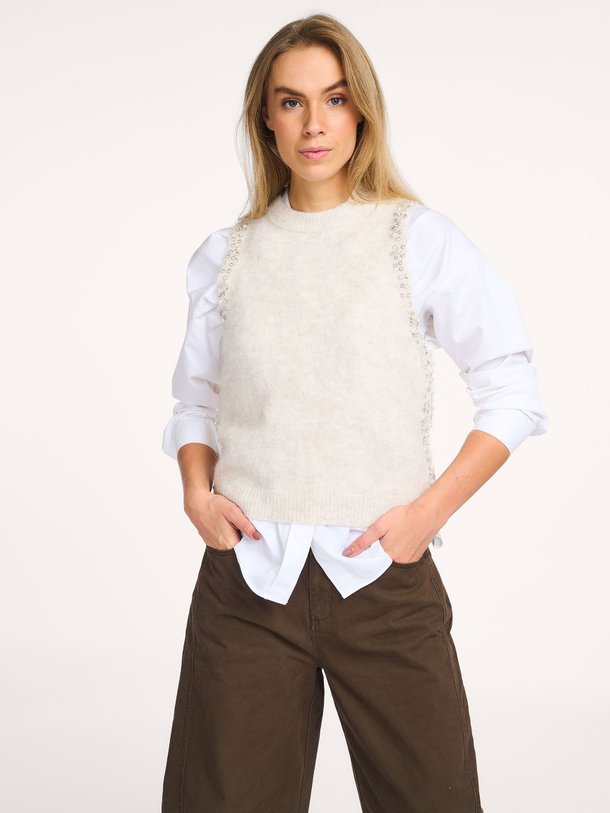 Ontdek de Lena wolmix spencer van Aaiko in de kleur crème bij Orangebag. Op werkdagen voor 21:45 besteld, morgen in huis.