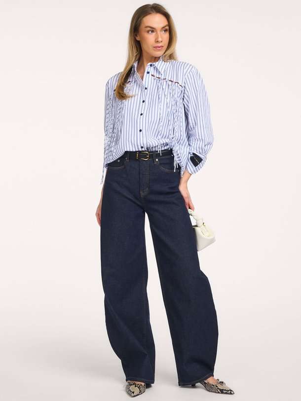 Ontdek de Katoenen gestreepte blouse met franjes van Haute L'Amitié in de kleur Wit bij Orangebag. Op werkdagen voor 21:45 besteld, morgen in huis.