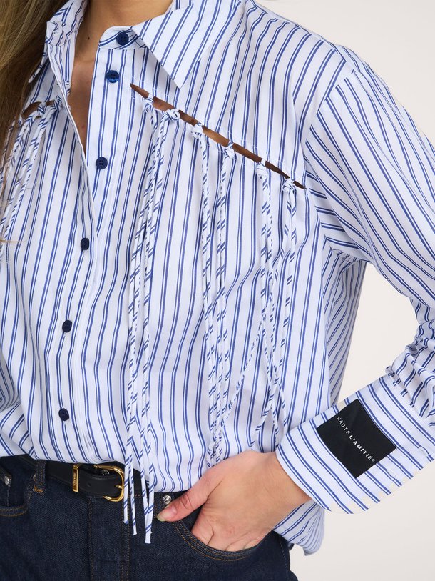 Ontdek de Katoenen gestreepte blouse met franjes van Haute L'Amitié in de kleur Wit bij Orangebag. Op werkdagen voor 21:45 besteld, morgen in huis.