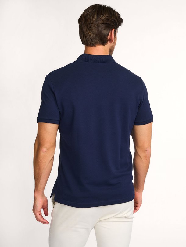 Lacoste Katoenen logo polo - Donkerblauw Ontdek de Katoenen logo polo van Lacoste bij Orangebag. Op werkdagen voor 21:45 besteld, morgen in huis.