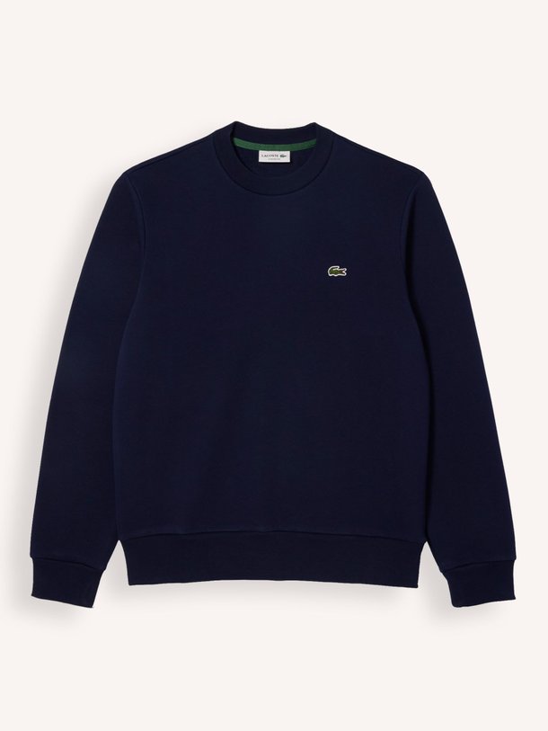 Lacoste Katoenmix logo sweater - Donkerblauw Ontdek de Katoenmix logo sweater van Lacoste bij Orangebag. Op werkdagen voor 21:45 besteld, morgen in huis.