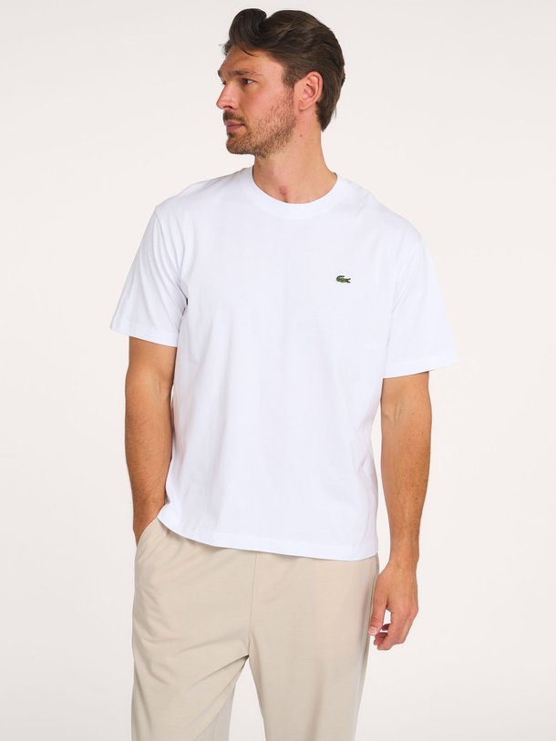 Ontdek de Katoenen logo T-shirt van Lacoste bij Orangebag. Op werkdagen voor 21:45 besteld, morgen in huis.