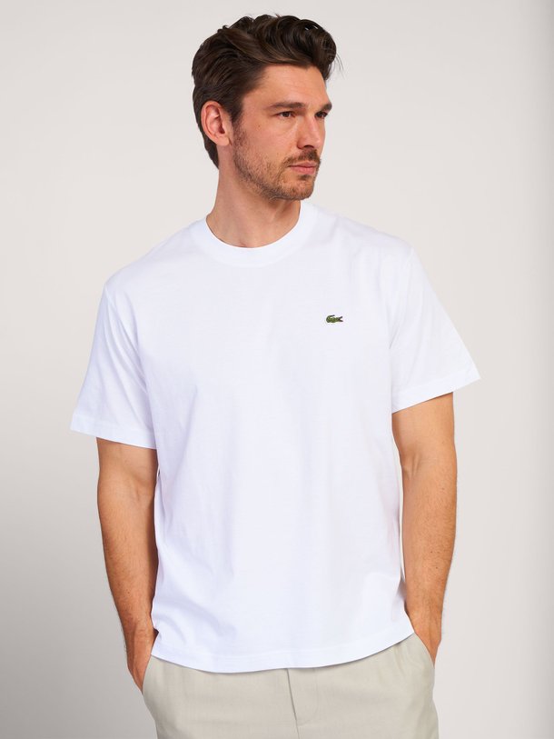 Ontdek de Katoenen logo T-shirt van Lacoste bij Orangebag. Op werkdagen voor 21:45 besteld, morgen in huis.