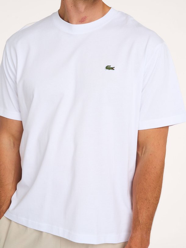 Ontdek de Katoenen logo T-shirt van Lacoste bij Orangebag. Op werkdagen voor 21:45 besteld, morgen in huis.