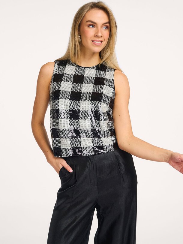 Ontdek de Donna, geweven top met pailletten van Frnch bij Orangebag. Op werkdagen voor 21:45 besteld, morgen in huis.