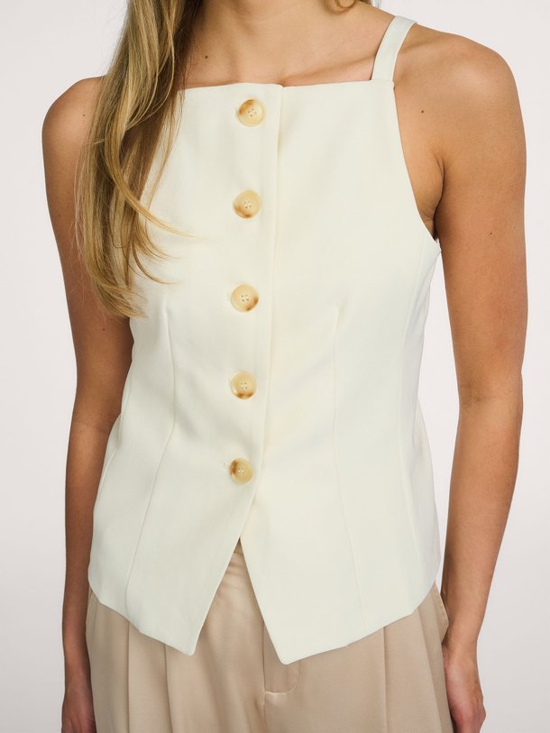 Neo Noir Kylie Structure waistcoat online kopen | Orangebag Shop de Neo Noir Kylie Structure waistcoat in off-white bij Orangebag. Een stijlvol mouwloos jasje met een prachtige structuur en knoopsluiting.