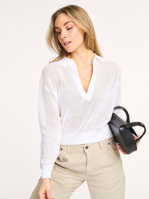 Ontdek de Jorgia katoenen opengewerkte polo top van Drykorn in de kleur wit bij Orangebag. Op werkdagen voor 21:45 besteld, morgen in huis.