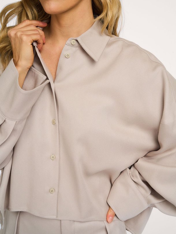 Drykorn Oshia lyocell blouse - Beige Ontdek de Oshia lyocell blouse van Drykorn in de kleur Beige bij Orangebag. Op werkdagen voor 21:45 besteld, morgen in huis.